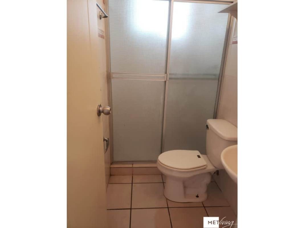 Kitchen with appliances cabinets at PH Plaza Valencia Bella Vista apartment