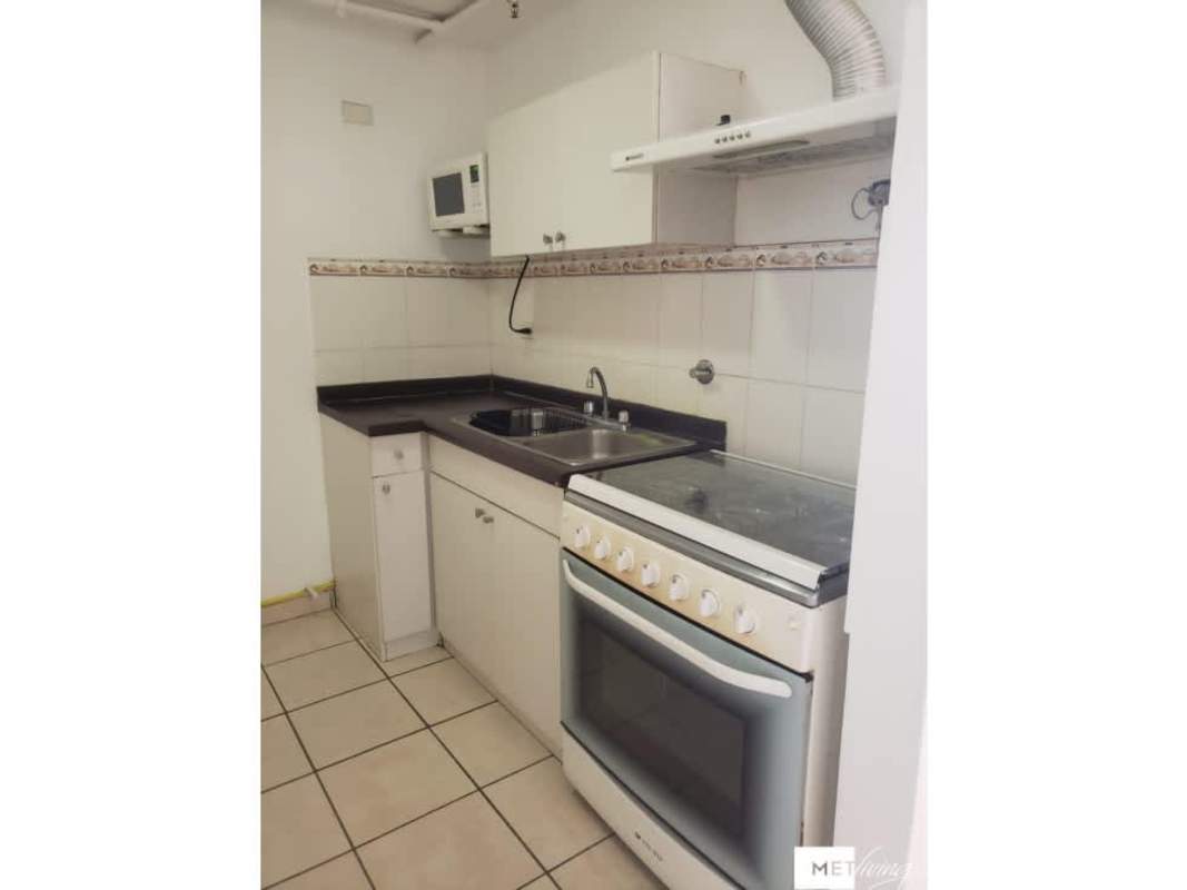 Compact modern bathroom glass door shower tile finish PH Plaza Valencia Panama