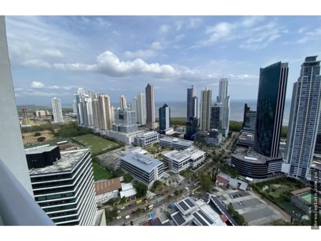 Modern kitchen with granite countertops wood cabinetry stainless appliances in PH Sevilla Costa del Este Panama