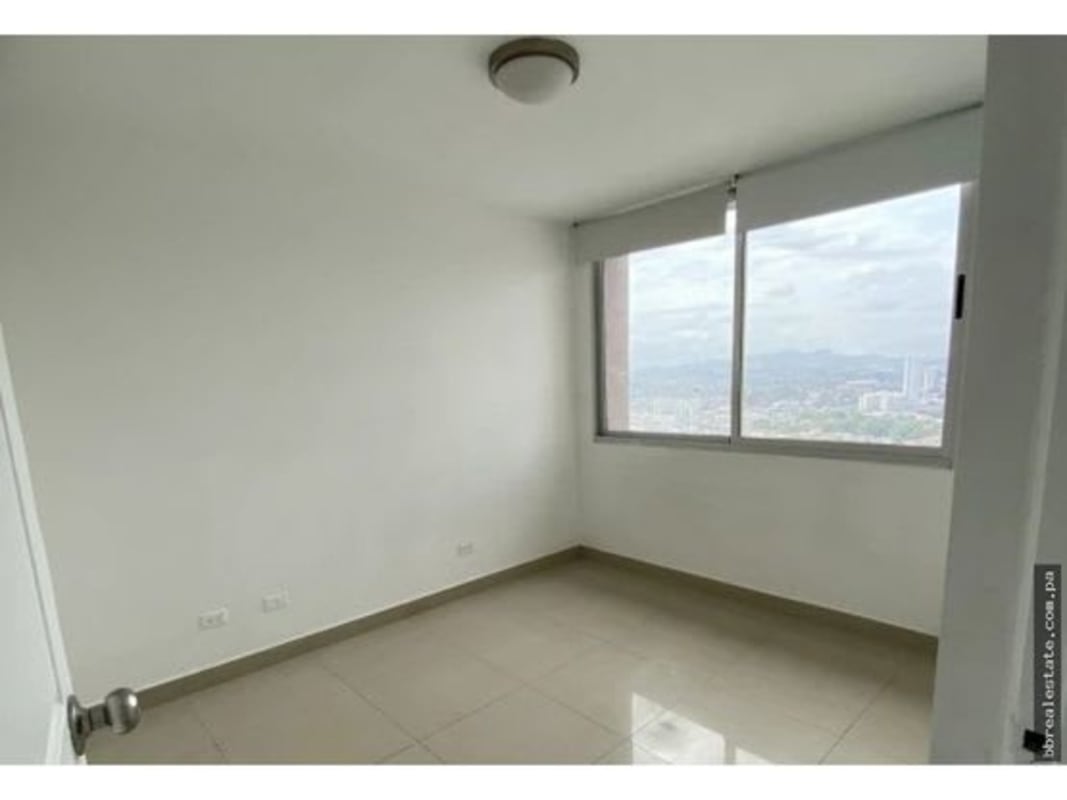 Minimalist bedroom with large window and skyline view in PH Sevilla Costa del Este