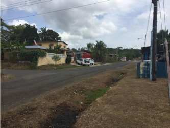 Residential road providing access to vacant flat development land near Rio Congo in La Chorrera Panama
