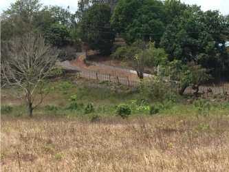 Rural countryside property with dirt road and fencing perfect for investment in La Chorrera Panama