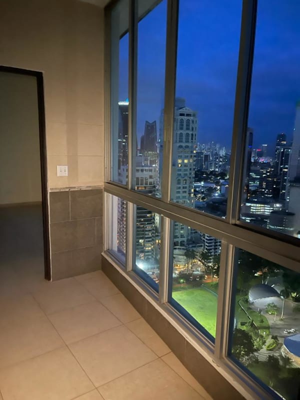 Elegant master suite with floor-to-ceiling windows ocean panorama Bayfront Tower Panama