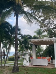 Resort style swimming pool with lounge chairs at Bijao Beach Resort Panama