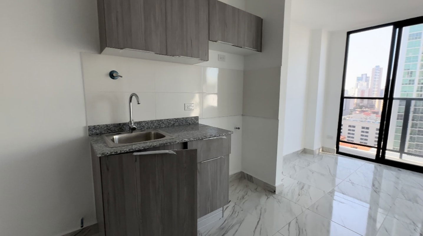 Stylish compact kitchen with granite counter and city view in PH The Gray Panama City