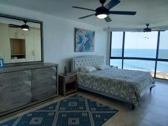 Spacious master suite in PH Coronado Country Club with panoramic ocean terrace access and AC