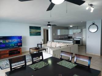 Spacious beachfront balcony with BBQ, ceiling fan, ocean views in Coronado Country Club condo