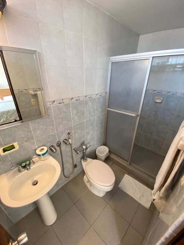 Tile bathroom with shower enclosure in hotel Calidonia Panama