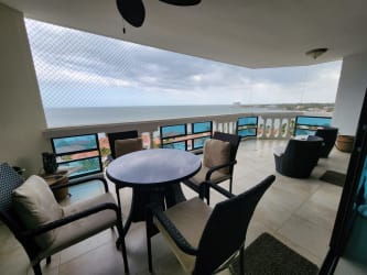 Expansive balcony with seating and 180-degree ocean view in Coronado Country Club Panama