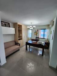 Home office area with window and modern furniture at Coronado Country Club Panama