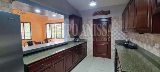 Wooden closet with French doors and garden outlook Altos del María house for sale