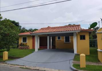 Single-story Mediterranean house with tiled roof and carport Coronado Panama