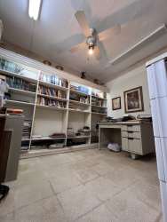 Spacious living area with tile floors, open plan and garden views in house near Golf Club Chitré