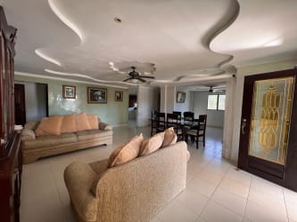 Simple bedroom with ceiling fan, AC, window security bars for sale Chitré