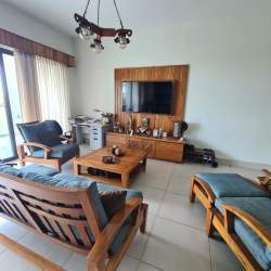 Bedroom in Casamar condo with ocean view, tile floors and ensuite bathroom San Carlos Panama