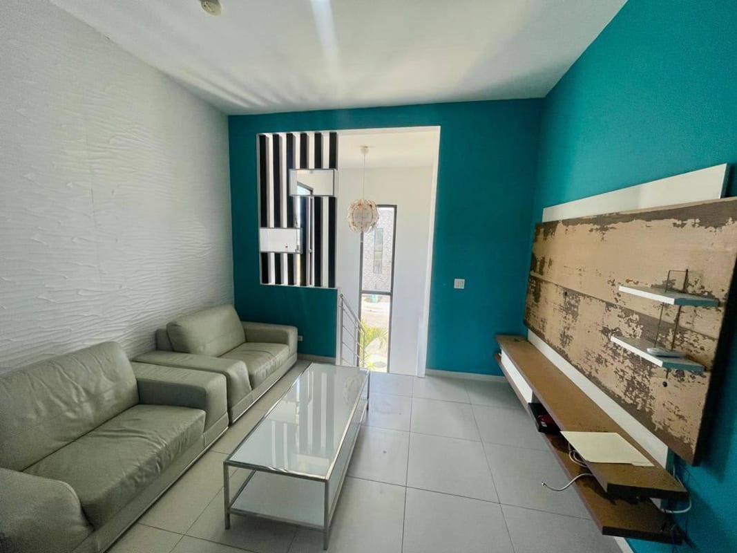 Bedroom with blackout curtains wooden floor closet Costa Sur house Panama