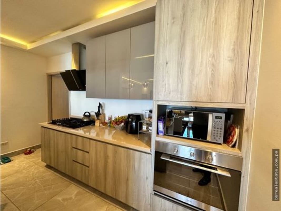 Bright bedroom with large window blinds and closet PH Premium Tower San Francisco Panama