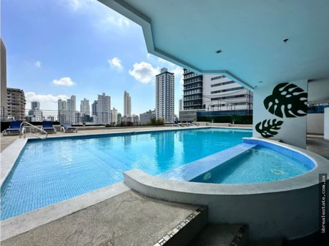 Rooftop outdoor swimming pool with city skyline view PH Premium Tower Panama
