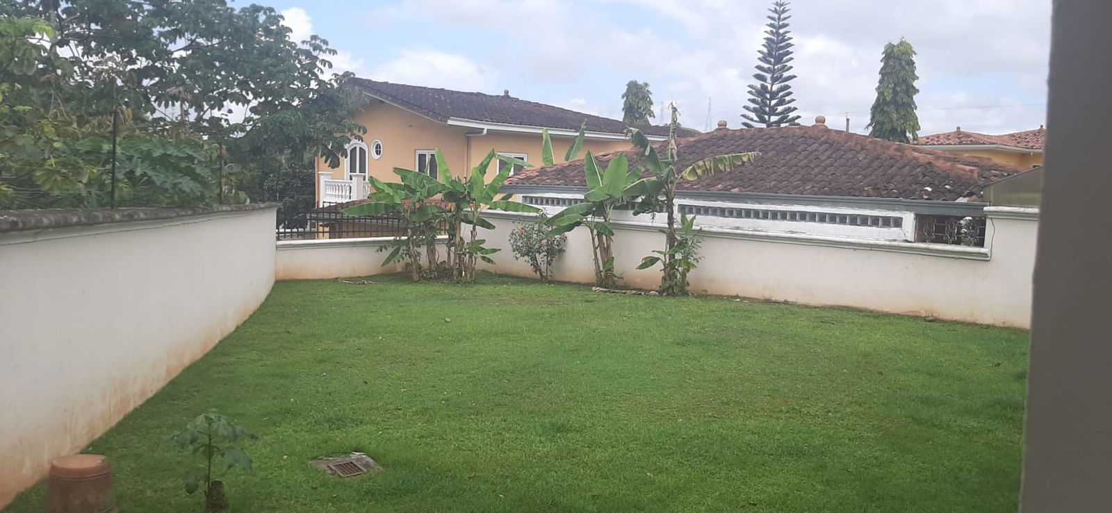 Large tropical landscaped garden ideal for pool or playground at Residencial Las Huacas Panama City