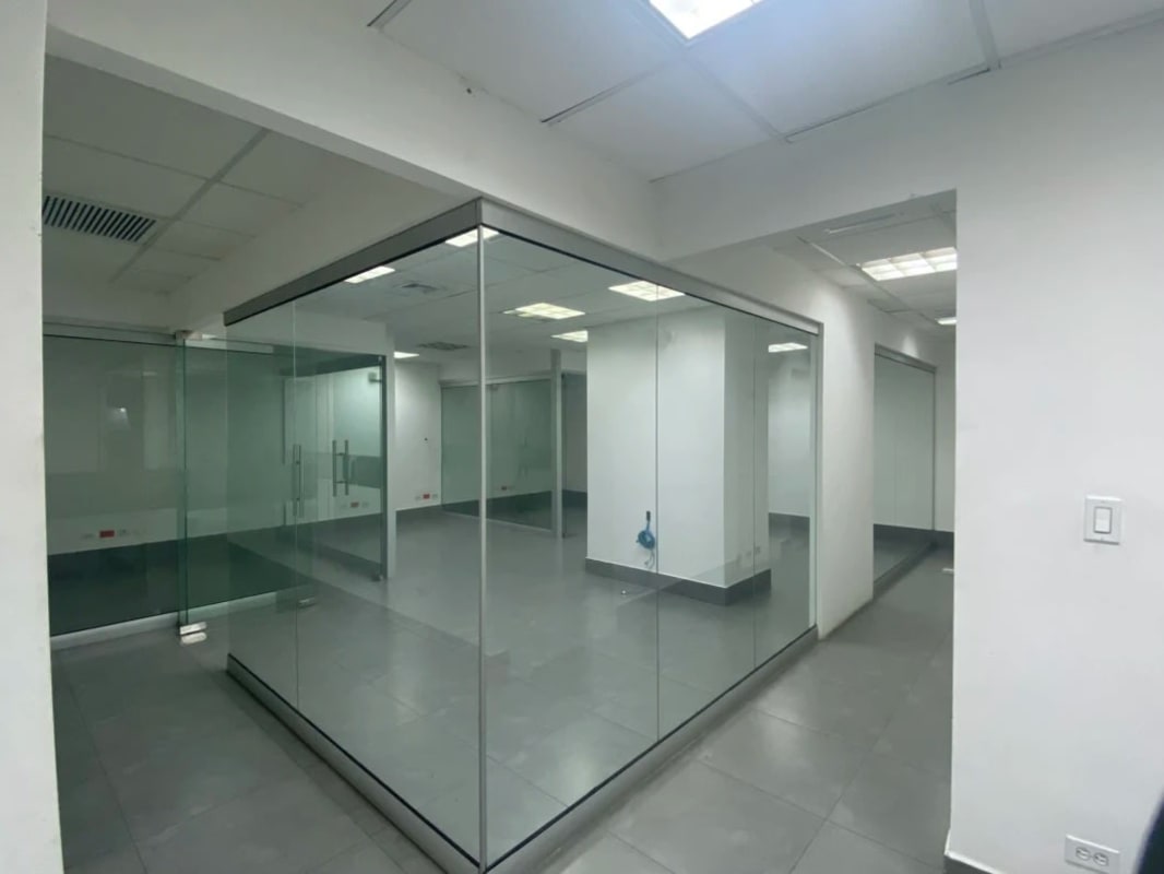Interior office with glass partitions and tiled floor in PH BICSA Bella Vista Panama