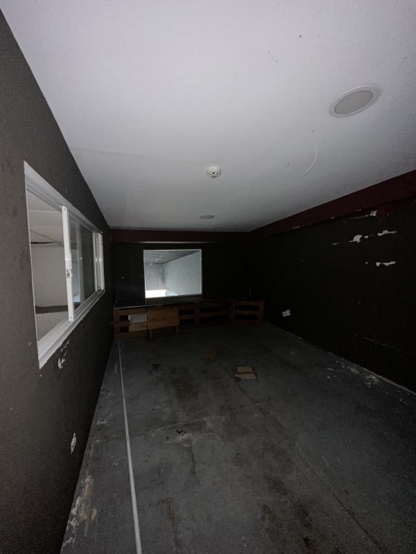 Dark interior commercial unit with window opening inside Boulevard Plaza Panama City