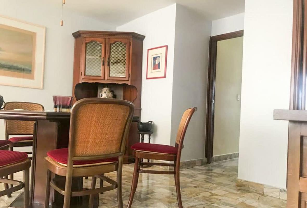 Cozy living and dining area with balcony access PH Vizcaya Punta Paitilla Panama City
