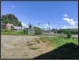 Fenced exterior commercial yard with mini deposits and sliding gate on Interamerican Highway Chame Panama