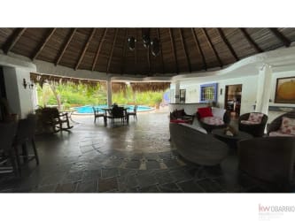 Spacious open-air palapa lounge bohio with pool view Punta Barco estate Panama