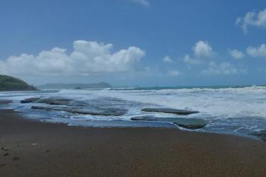 Pristine shoreline with coral reefs and sandy Caribbean beach ideal for eco-resort Panama