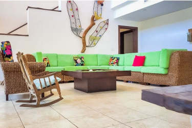 Rustic style bathroom with natural stone wall shower at Punta Barco Viejo villa