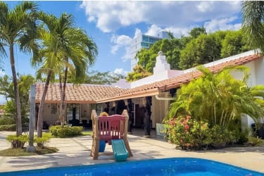 Mediterranean-style house with swimming pool and children's slide in Punta Barco