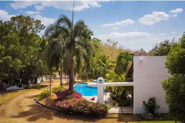 Spacious kitchen with wooden cabinetry and island at Punta Barco Viejo luxury estate