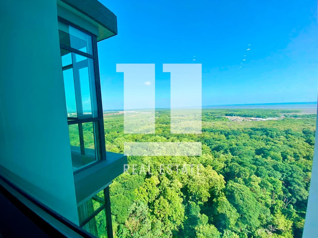 Luxury bedroom with floor-to-ceiling windows, panoramic views and mounted TV in Albatross Santa Maria Panama