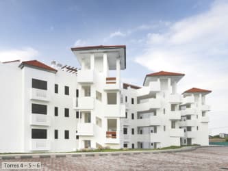 Multi-story Mediterranean style condo buildings with balconies colony architecture in Panama beach project