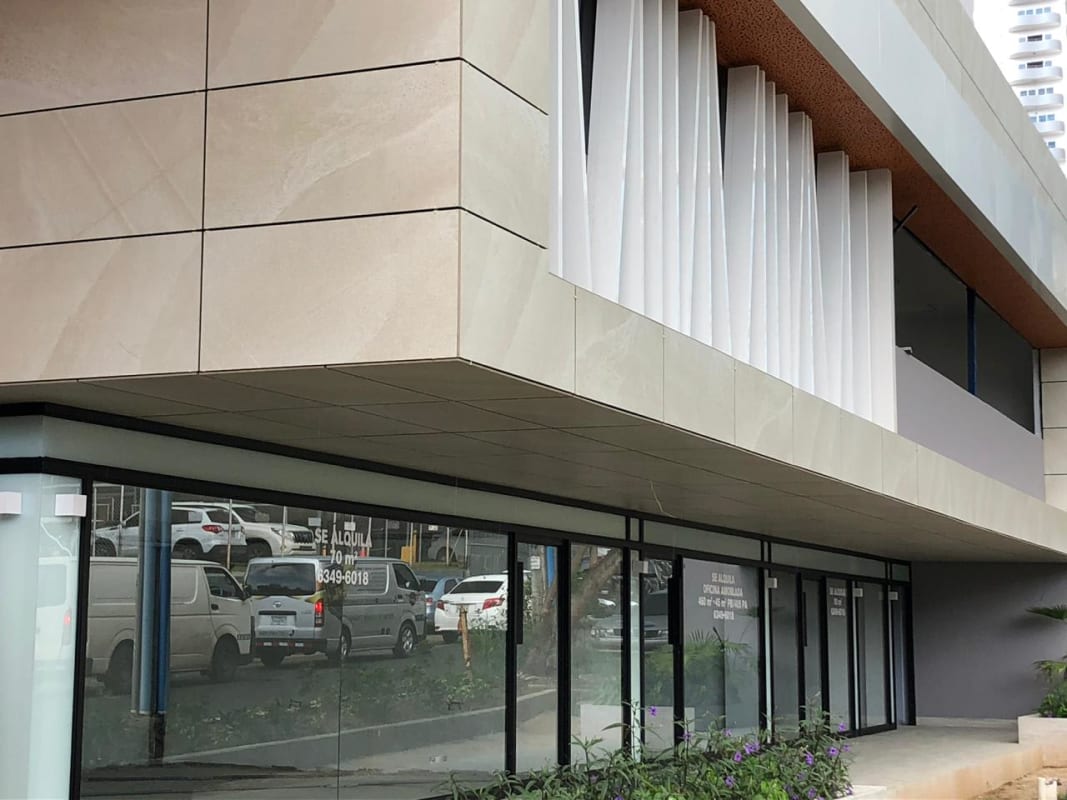 Modern retail and office complex with prominent signage and unique facade in Marbella Panama City