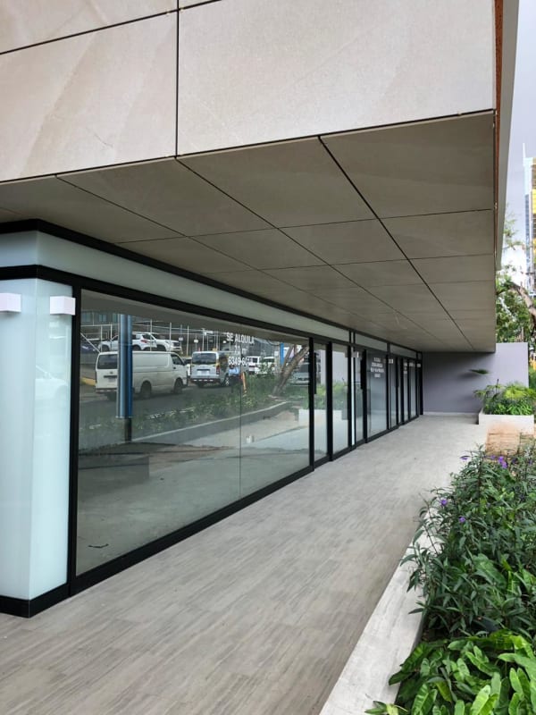 Corner retail or office space with floor-to-ceiling windows at Plaza Nodo54