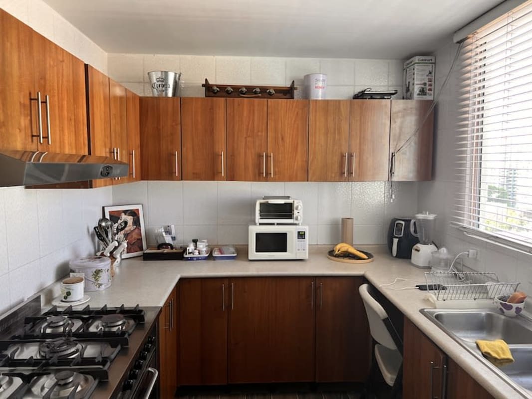 Modern tiled bathroom with glass shower PH Andros Tower El Cangrejo Panama