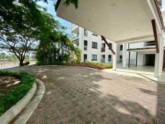 Spacious backyard green lawn patio of condo Casamar Altamar Panama