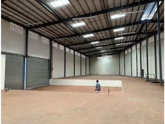 Empty warehouse interior with high ceilings and concrete floor in Burunga Panama
