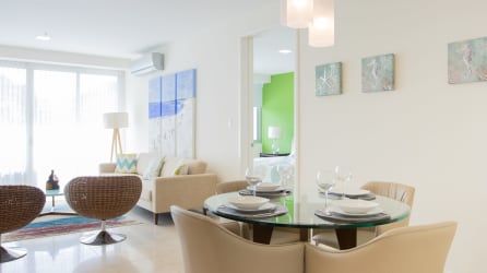 Gourmet kitchen with stainless appliances open to living space in Casa Bonita Panama.