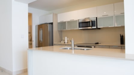 Modern bathroom with glass shower in Casa Bonita luxury apartment Panama Pacifico.