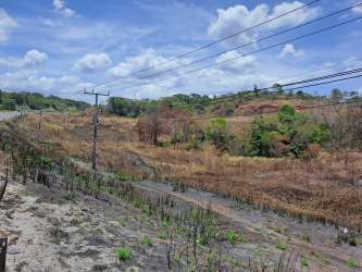 Unimproved commercial lot on hillside near highway in Panama ideal for development