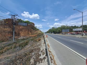 Aerial image of commercial land parcel outlined with natural vegetation near highway in Arraijan Panama