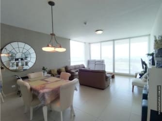 Bright furnished living room with Pacific view in Playa Blanca condo