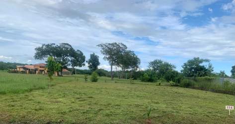 Recreational area with pool tennis court mountain views in Chame Panama community