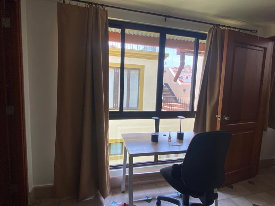 Rooftop terrace with panoramic views of Panama City skyline and historic Casco Viejo