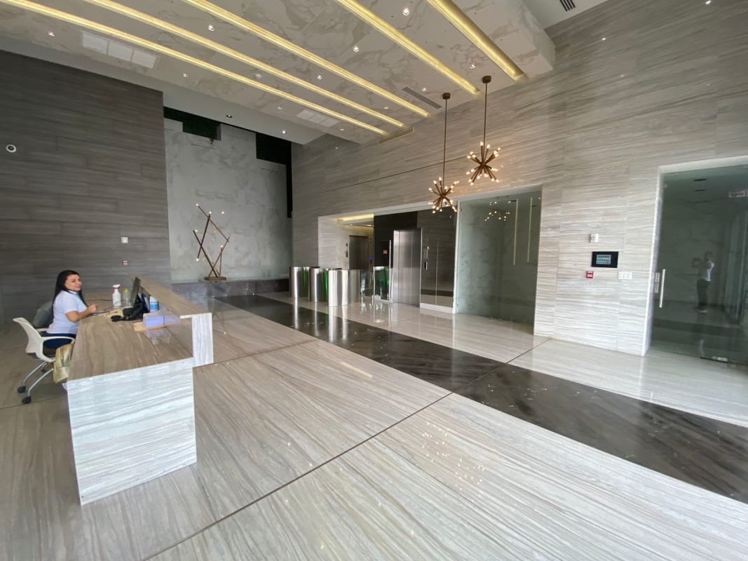Stylish lobby with marble, designer lighting, security access at The Towers Panama City