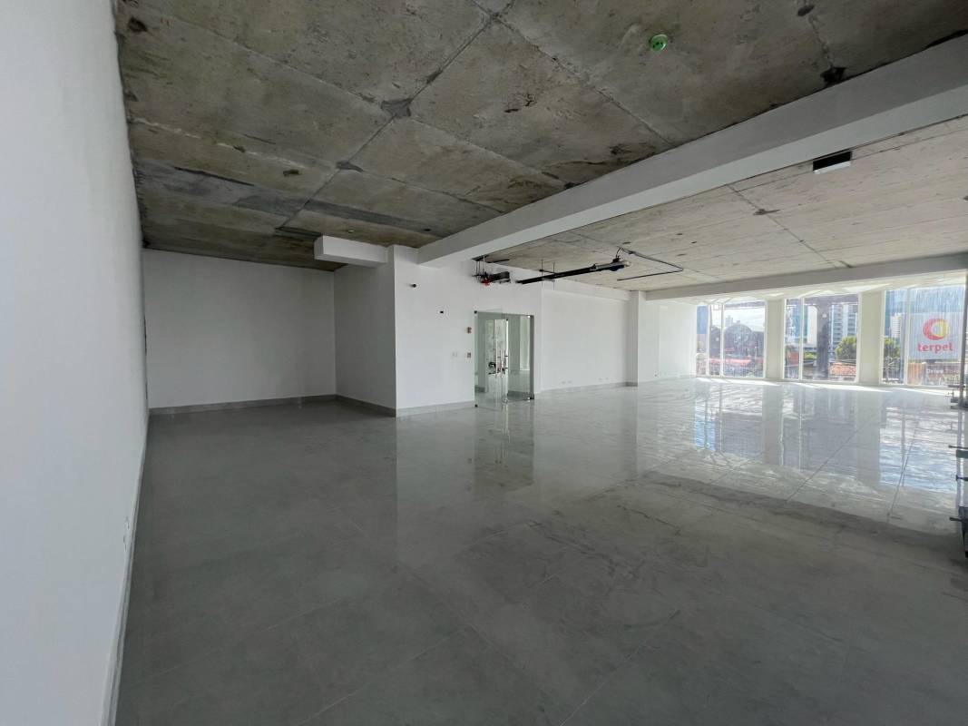 Modern commercial open space with tiled floors and large windows in The Towers San Francisco Panama