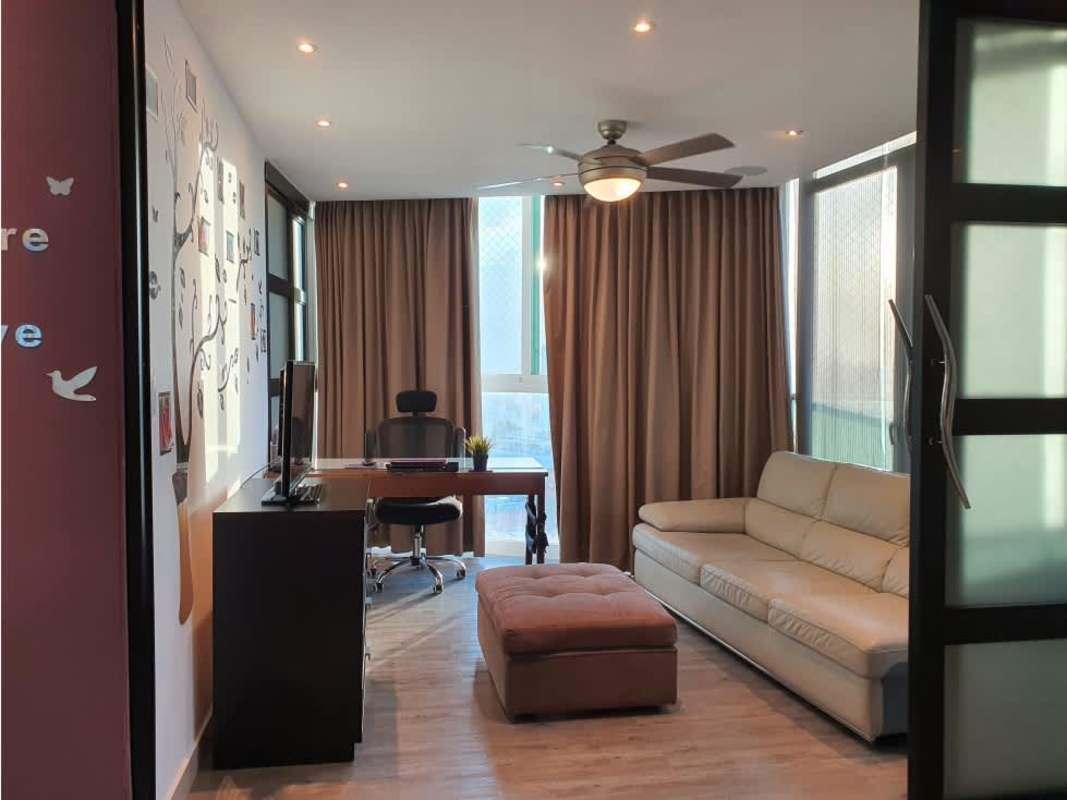 Living space with city views, sectional sofa, workspace at PH Highland View Hato Pintado Panama