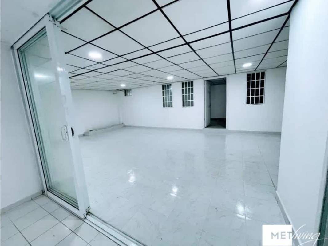Large multipurpose room with grid ceiling and sliding glass in La Fontana Chanis Panama